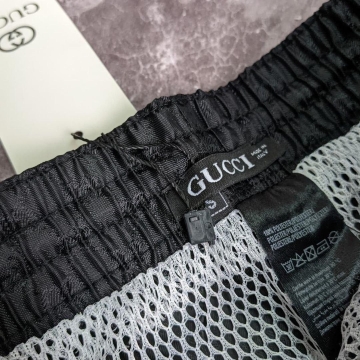 Брендовые черные плавальные шорты Gucci С-329