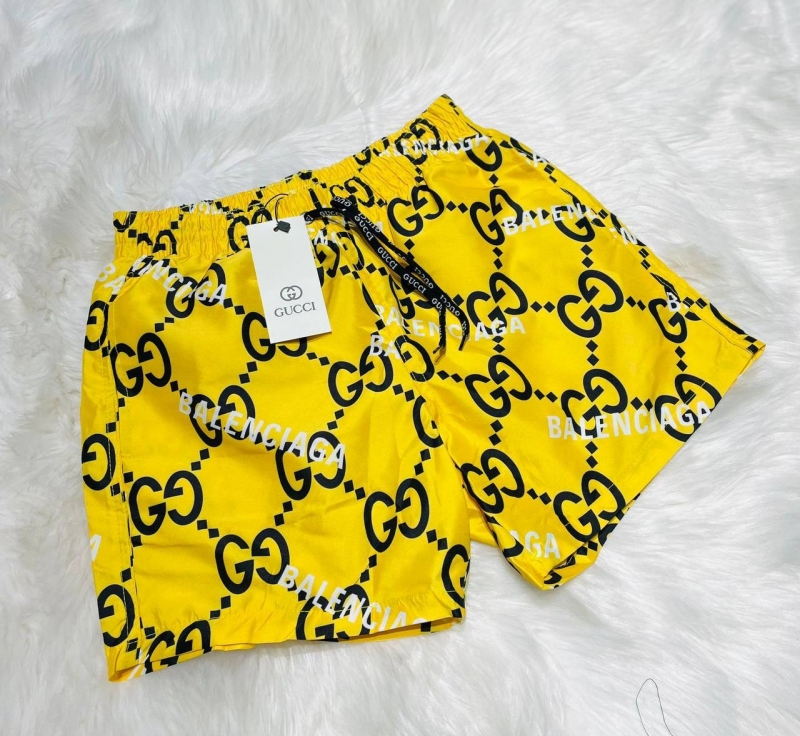 Желтые пляжные шорты Gucci С-472